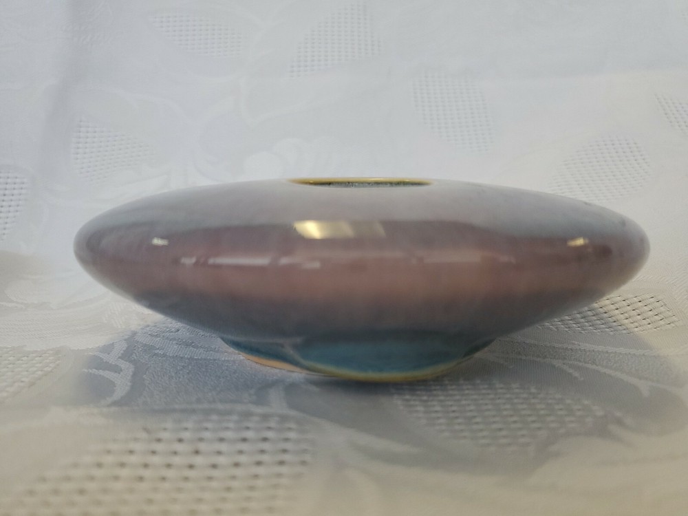 Ceramic single flower bud display vase.