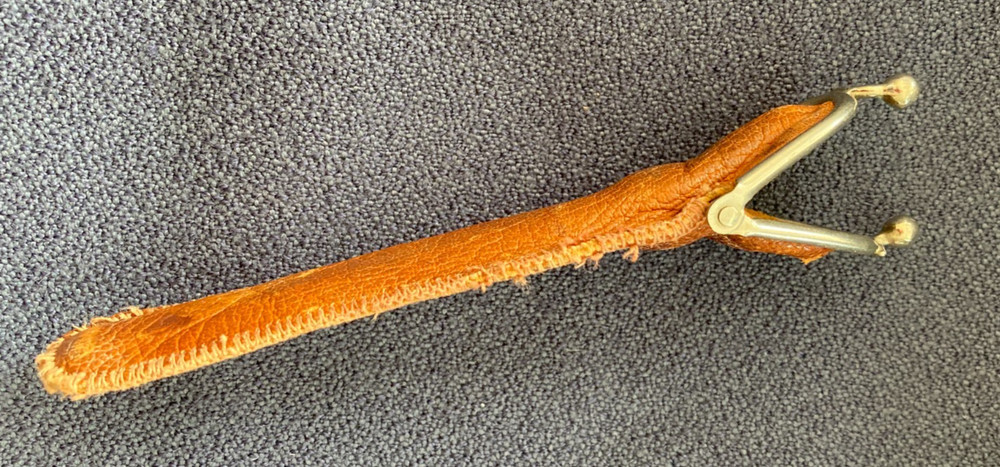 Antique Silver and Ivory cigarette holder with leather case.