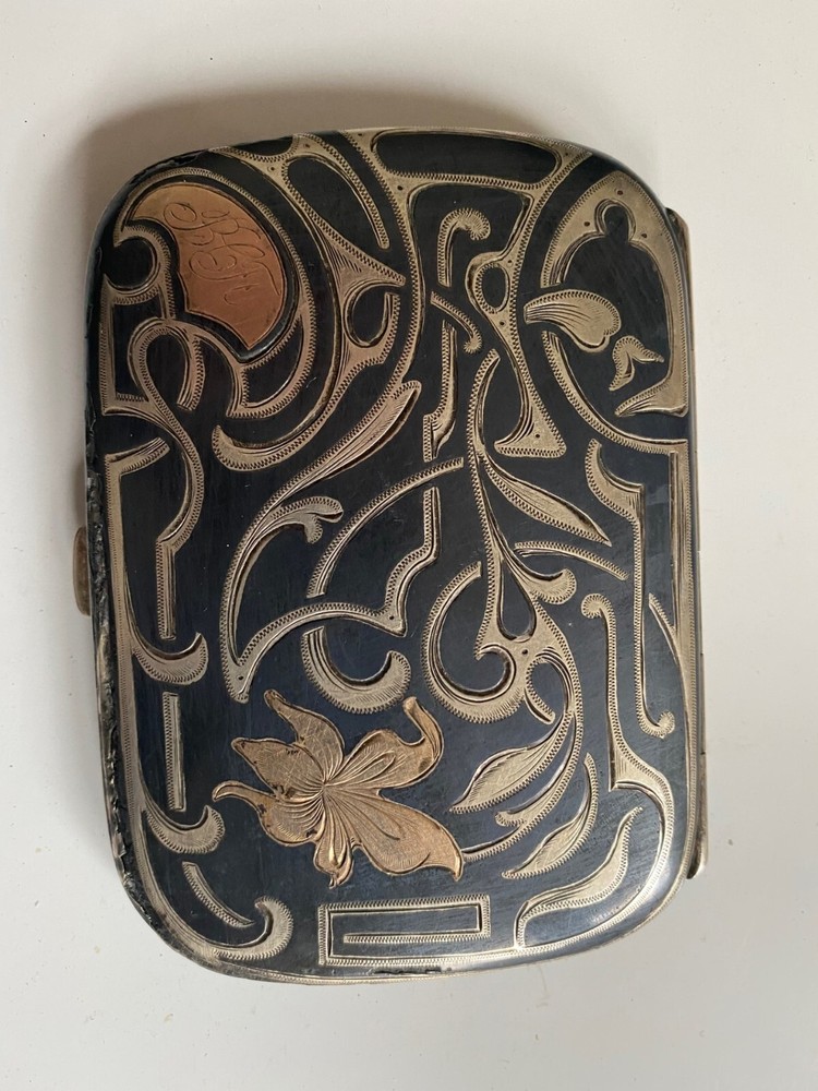 vintage silver cigarette case with gold inlay