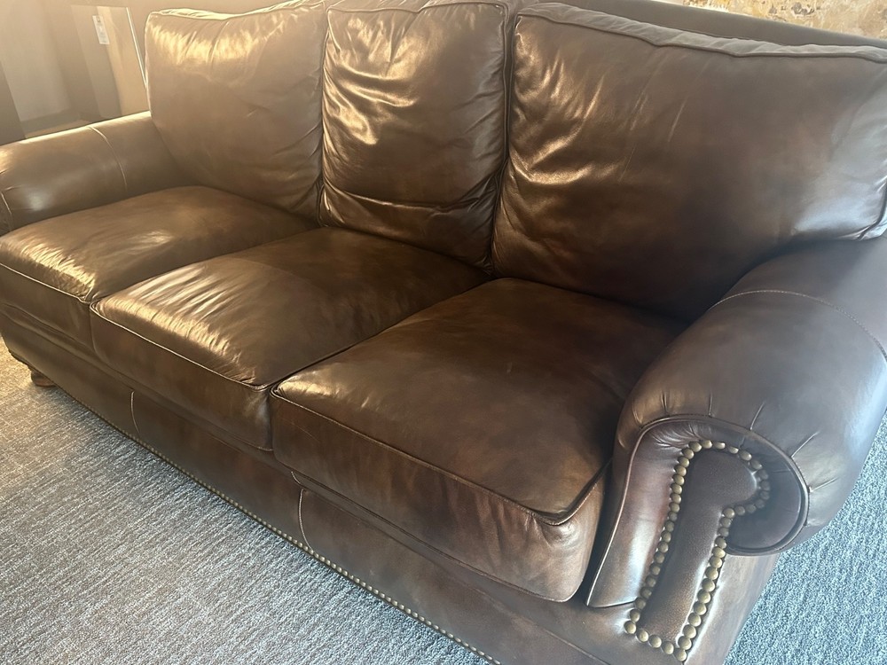 Gently Used Brown Leather Sofa