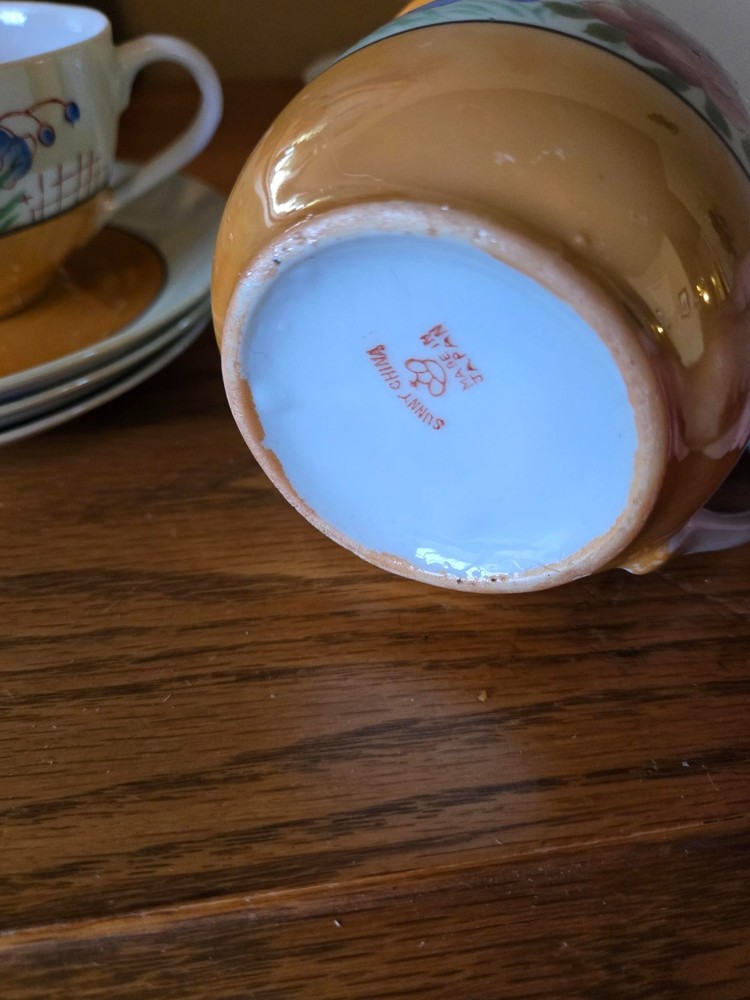 Sunny China - Creamer, 3 saucers and two teacups- Lusterware
