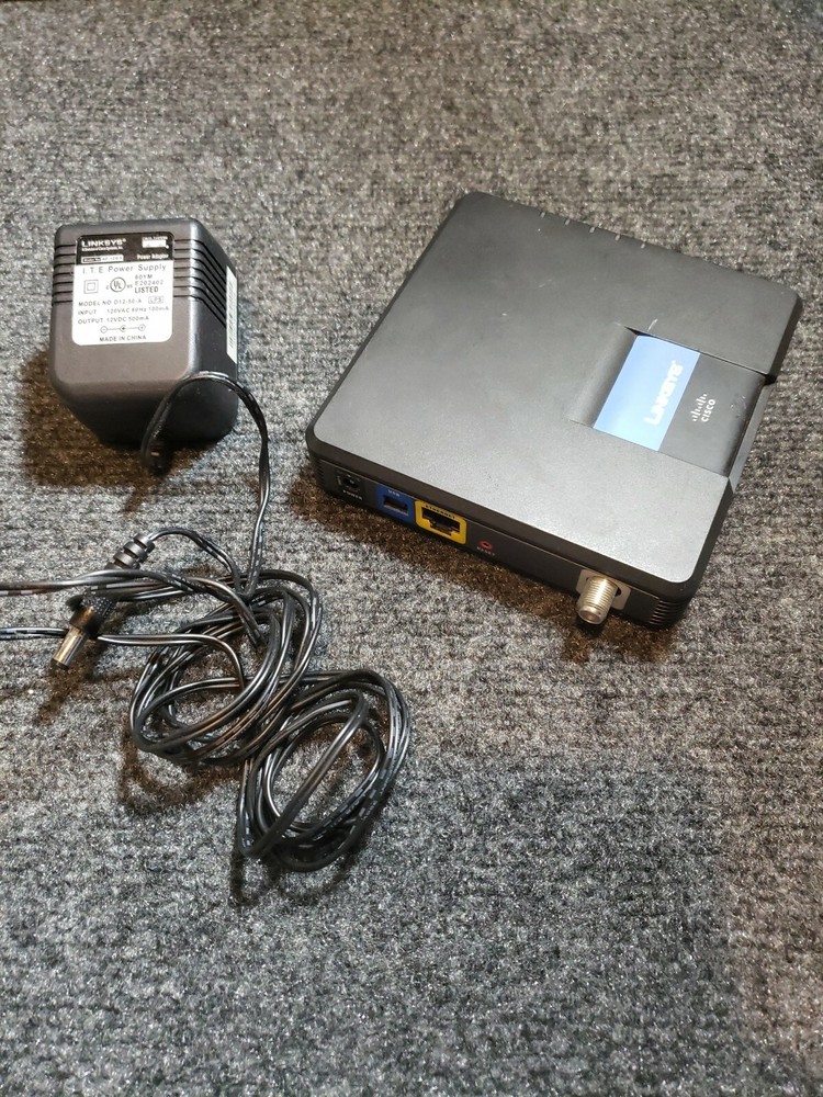 Cisco Linksys CM100 100 Mbps Cable Modem + Adapter - Used