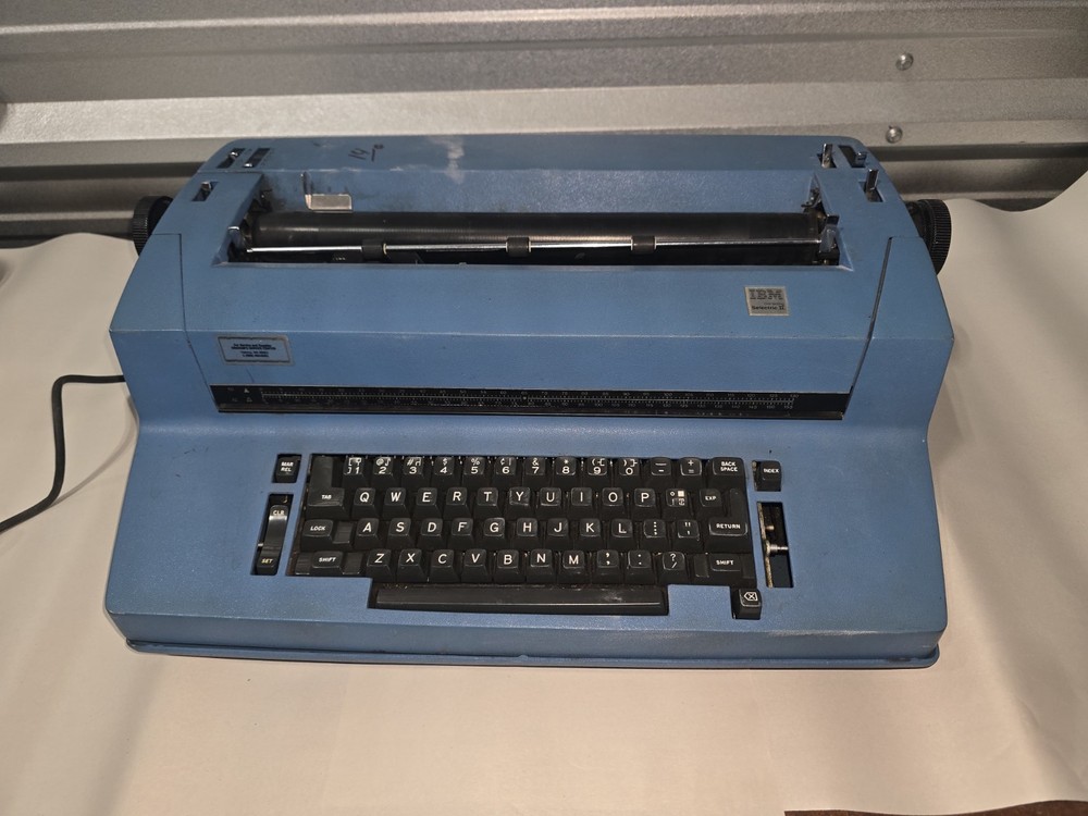 vintage IBM Correcting Selectric II typewriter in blue