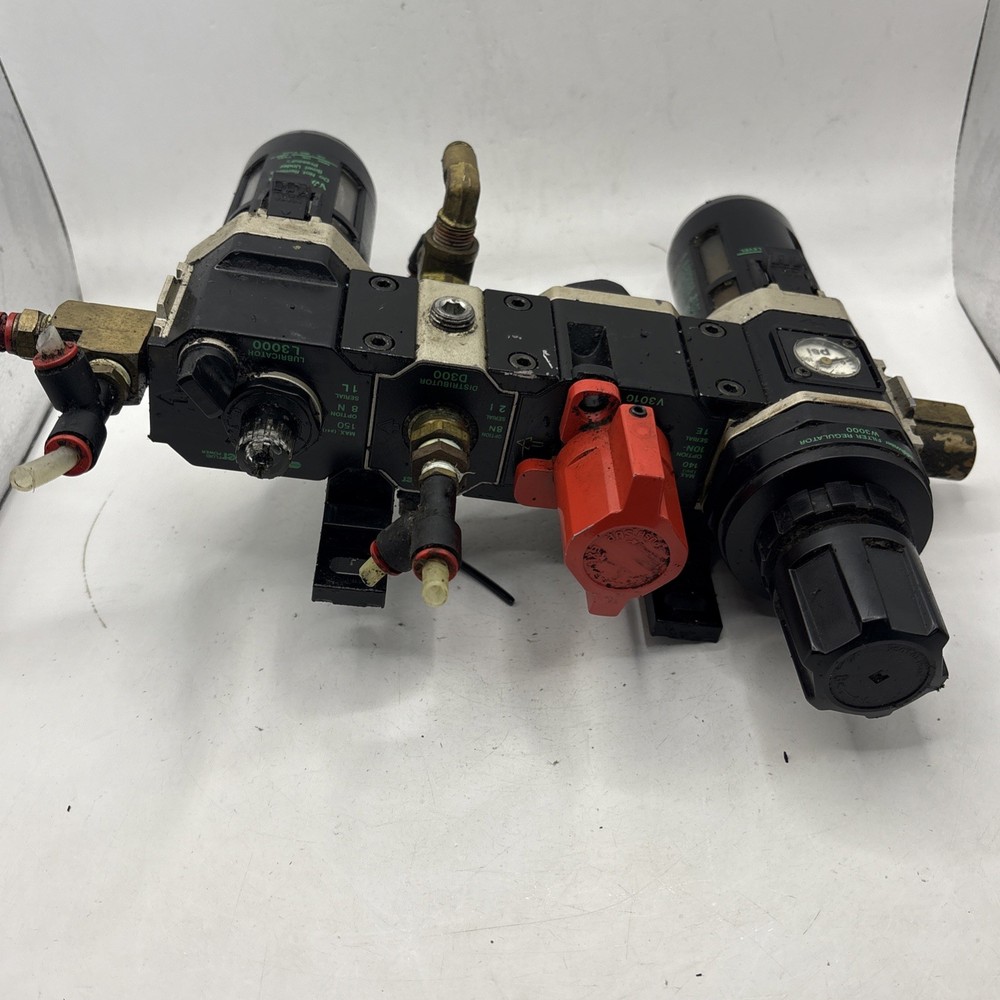 Miller Filter Regulator, Exhaust Valve, Distributor, And Lubricator Assembly