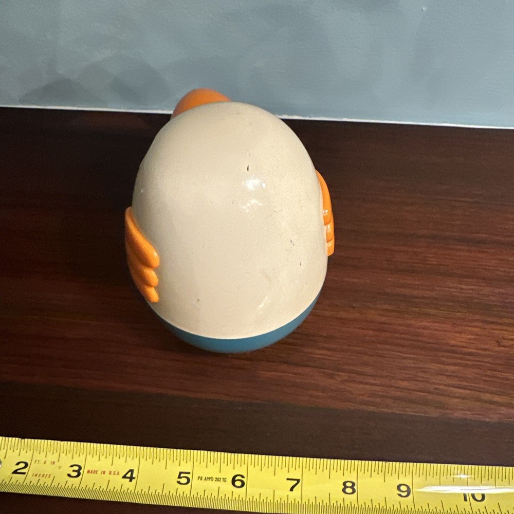 Vintage Musical Roly Poly Penguin pull behind toy