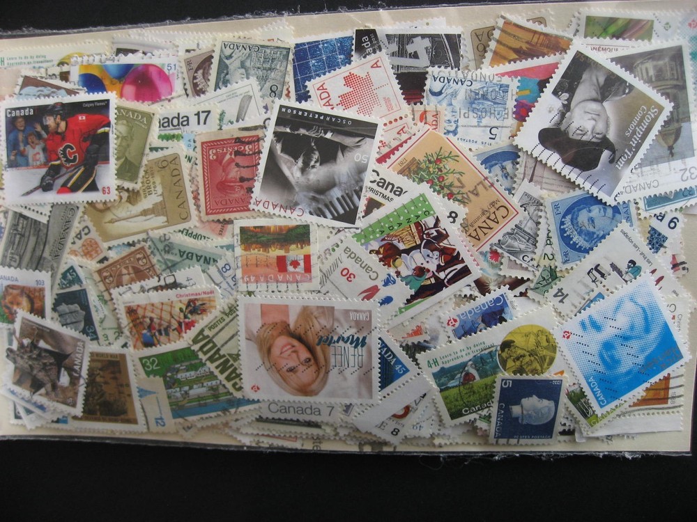 Canada colossal mixture (duplicates, mixed cond) 10000 35% comems, 65% defins