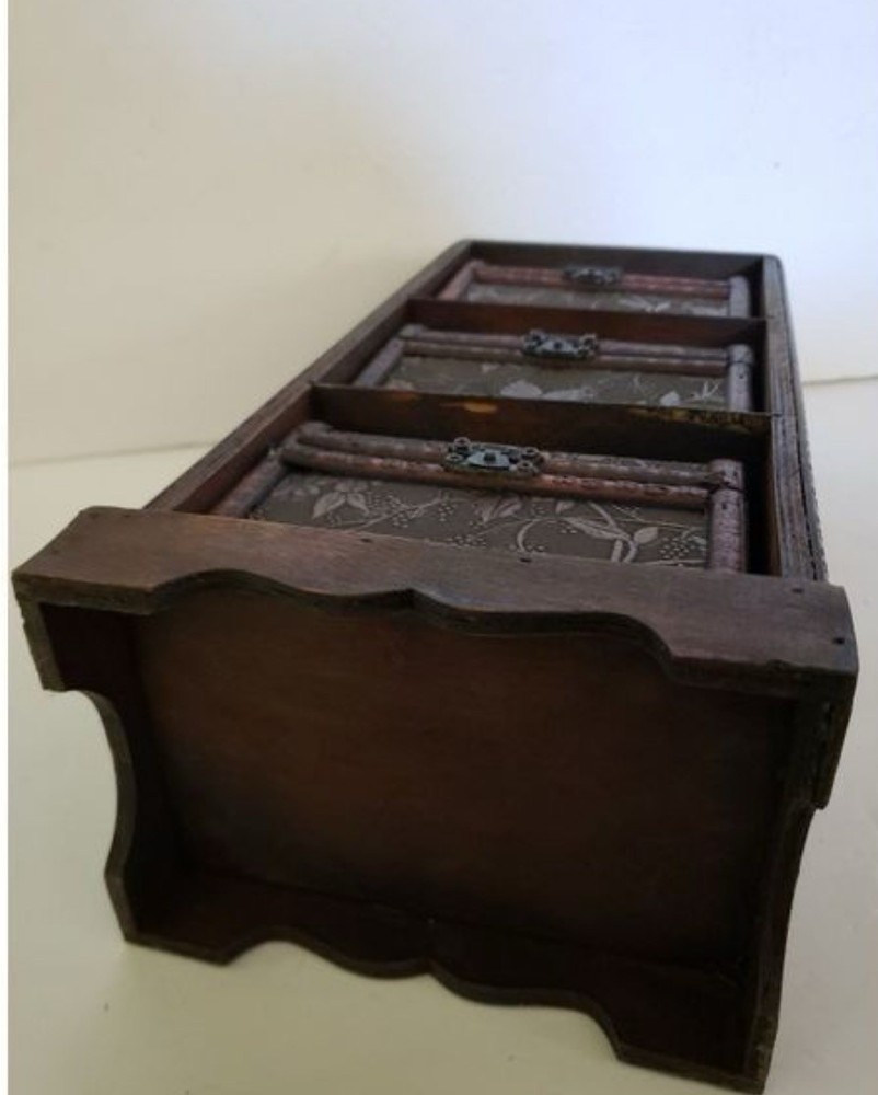 3 Small Storage Trunks in Shelving Unit