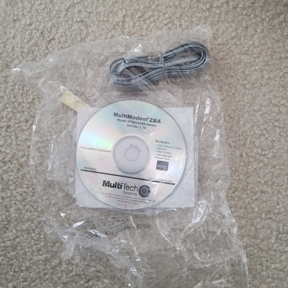Multitech Systems Multi Modem Model: MT5634ZBA 56Kbps Data/Fax with accessories.