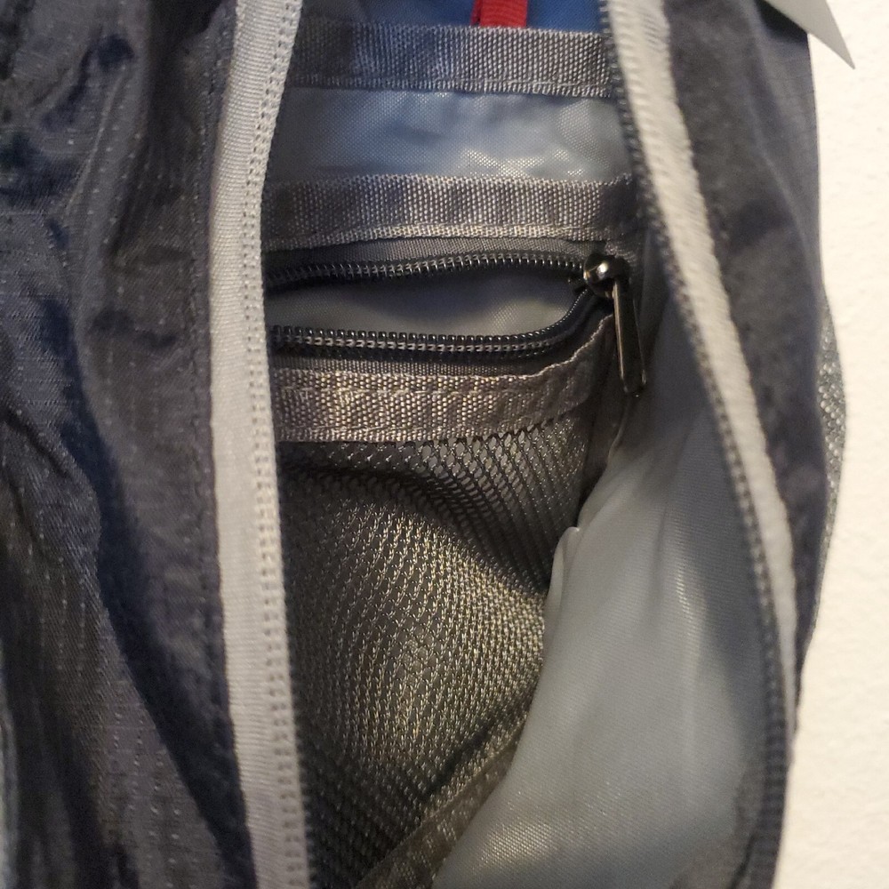 Waterfly Sling Pack - Black Gray Adjustable Strap Pockets Zippered NWT