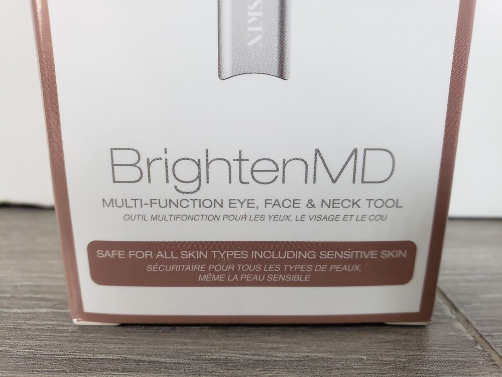 NEW SEALED Trophy Skin Brighten MD Multi Function Eye Face Neck Tool