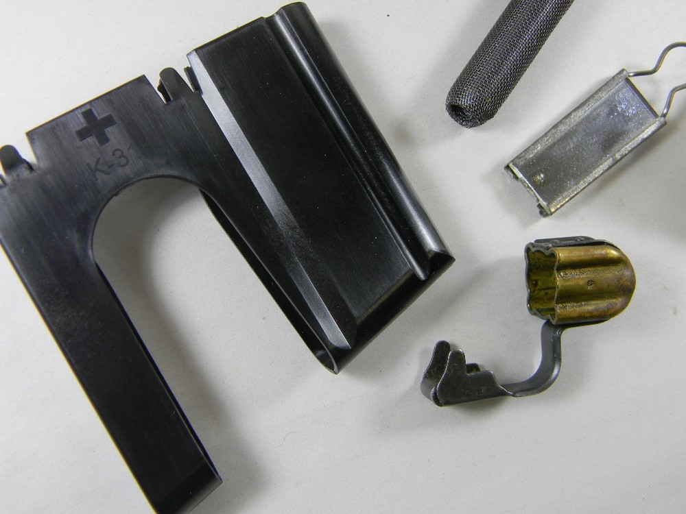 SWISS ARMY ISSUE K-31 CLEANING SET WITH POLYMER LOADING CLIP AND MUZZLE COVER