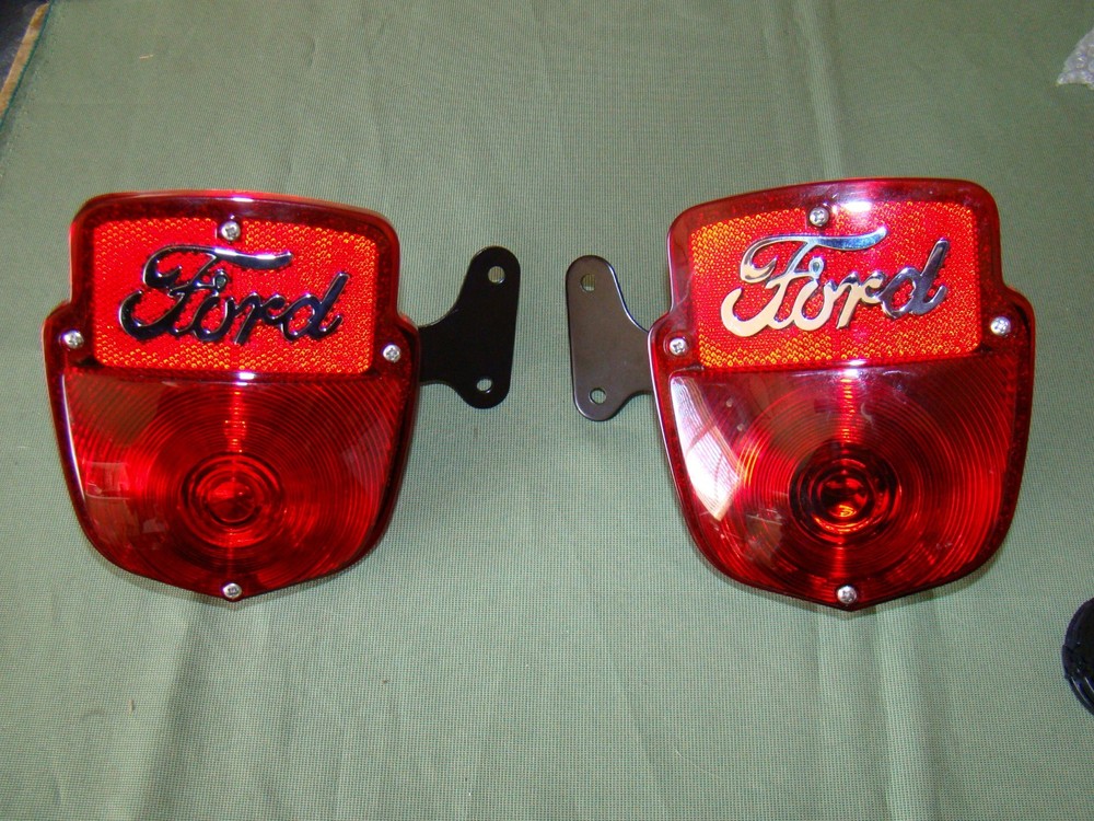 53 54 55 56 Ford step side pick-up truck taillights with Ford script tail lights