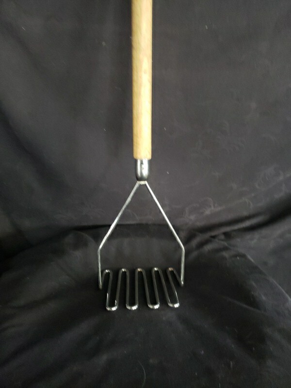 23 "   chrome plated potato mashers with wood handle,