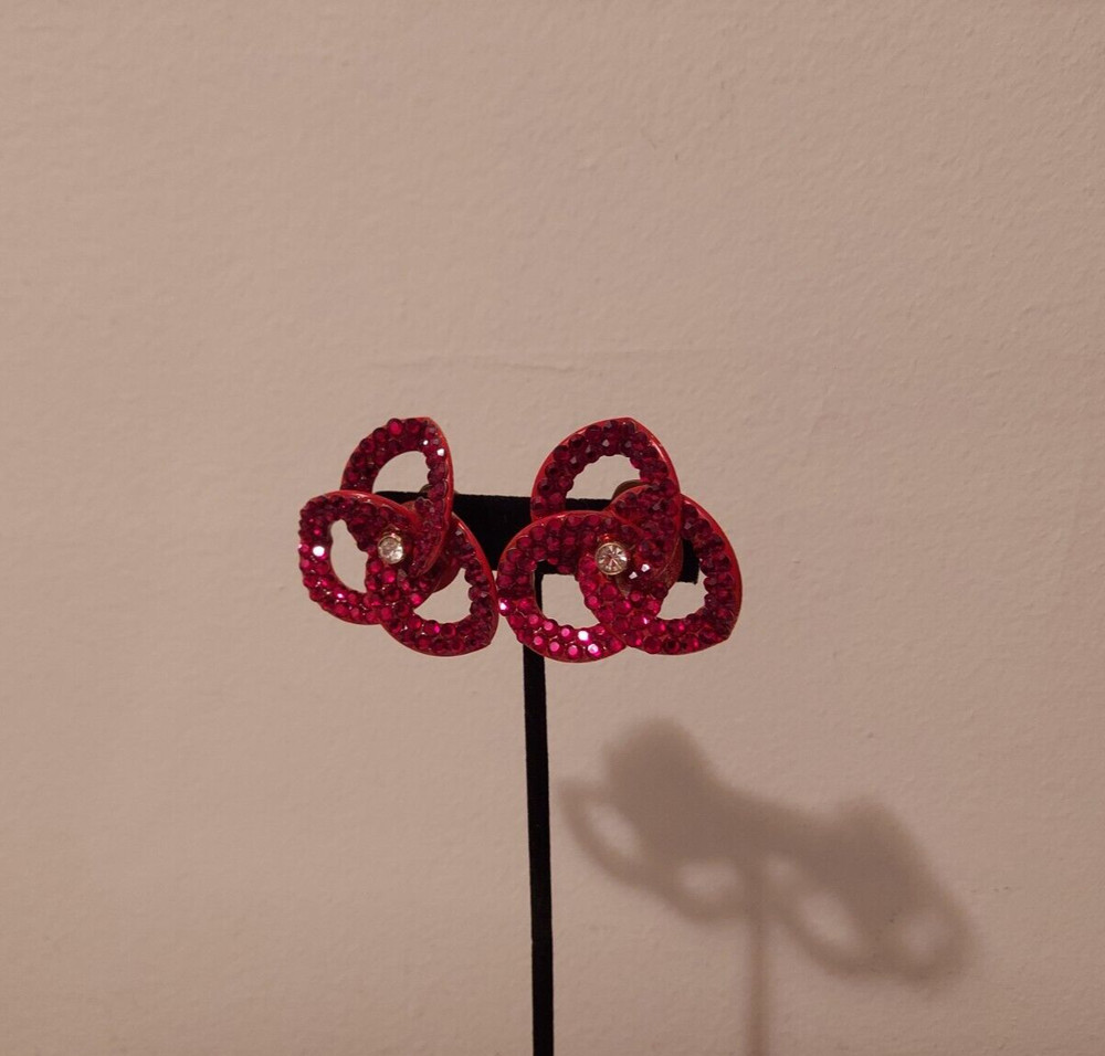 red rhinestone linked intertwined loop statement clip earrings