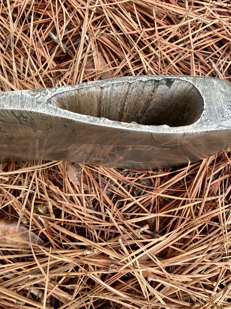 Single Bit Axe With A Duck Scenery Etched On Both Sides.
