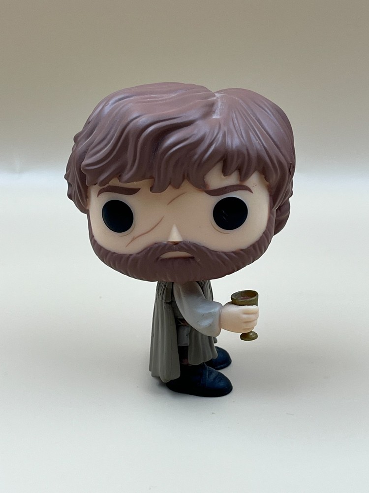 Four Funko Pop Vinyl Figures.