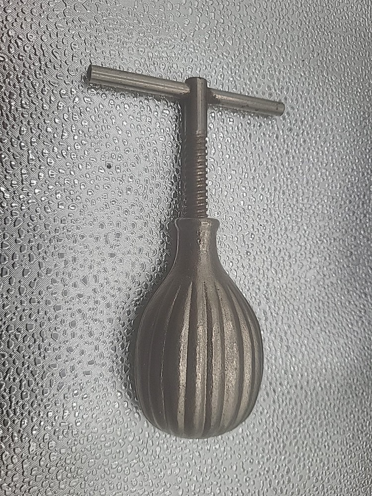 Vintage nut cracker Cast Iron T Handle Screw Shell Design