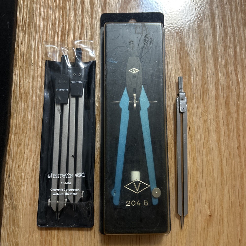 Lot of four drafting compasses