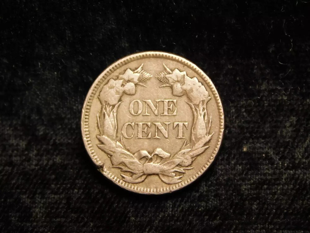 1857 Flying Eagle Cent w/ Ragged Clip & Lamination