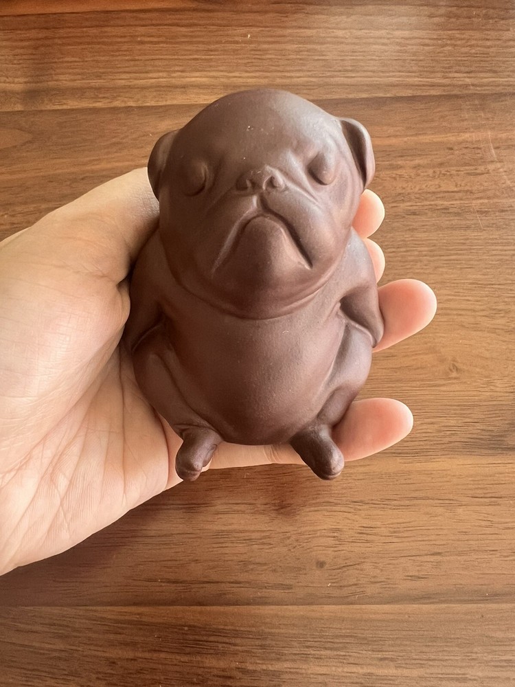 Purple clay ceramic puppy.