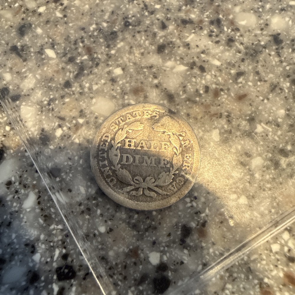 Seated Liberty Silver Half Dime with arrows unreadable date