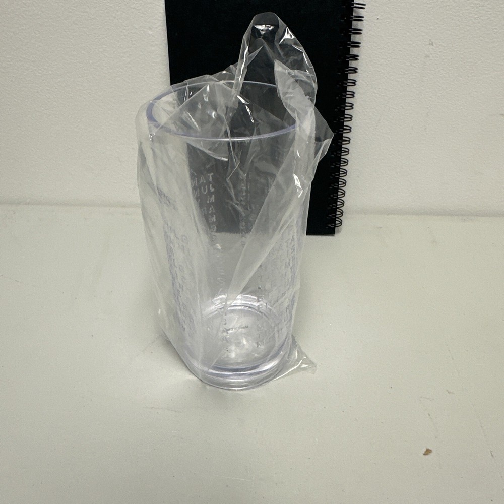 The Botanist Islay Dry Gin a plastic cup