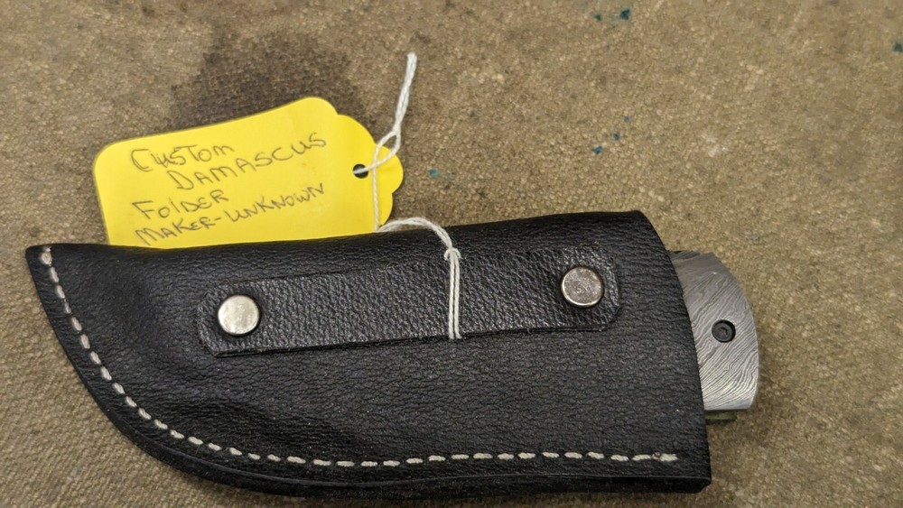 heavy folding Damascus bladed pocket knife with leather sheath