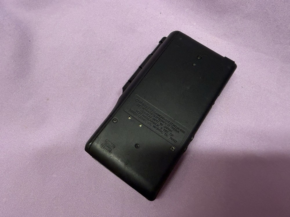 Optimus Micro-33 Voice Activated Microcassette Recorder. Not Tested.