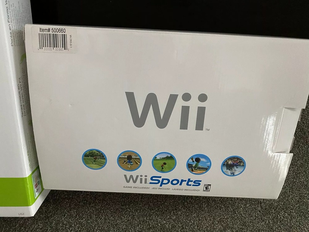 Nintendo Wii Bundle (includes Wii Fit And Other Games And Accessories)