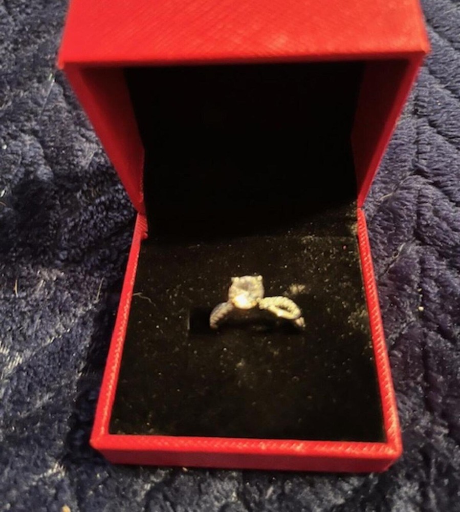 Elegant Silver-Tone Engagement Ring with Clear Stone