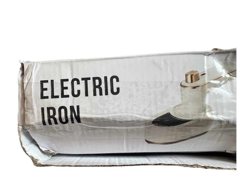 New in box small electric iron