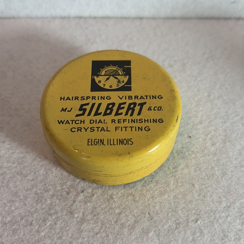 1950’s Silvery Watch Tin Container 2 Inch Diameter