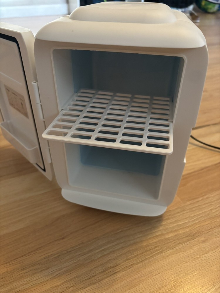 Hardly Used Cow Print 6 Can Mini Fridge