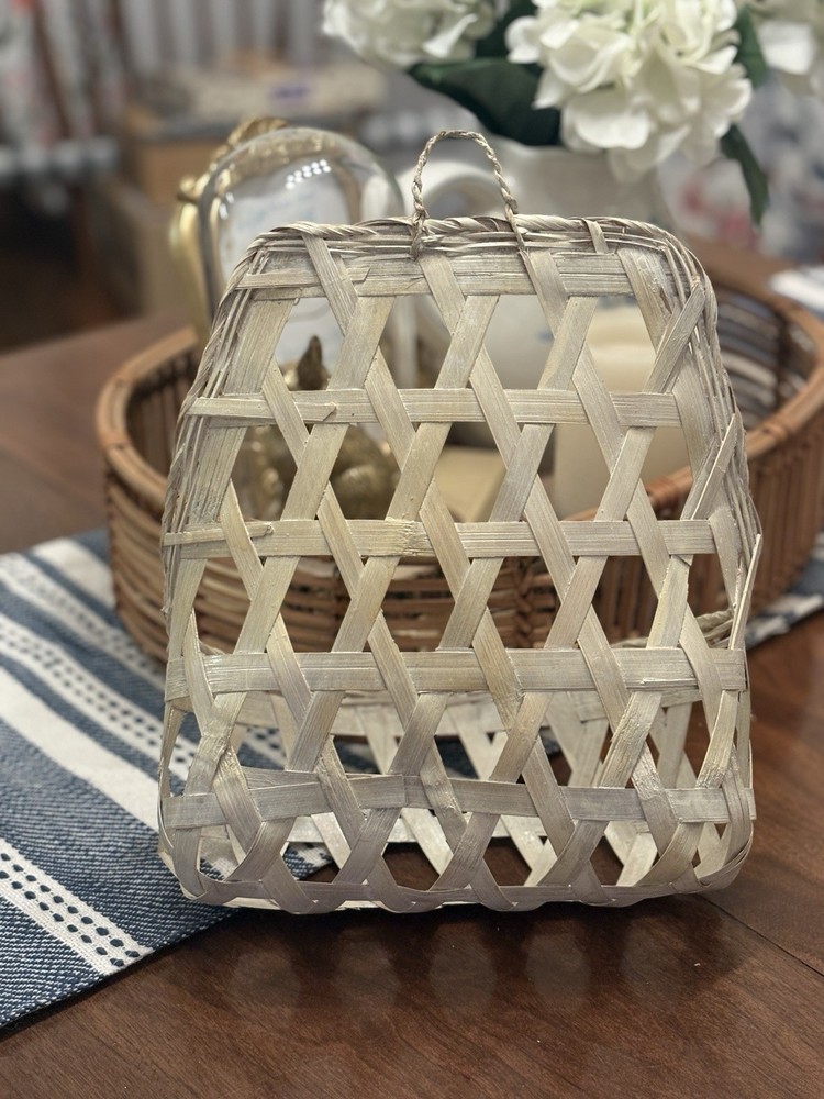Vintage woven hexagonal pattern basket with rope handle.