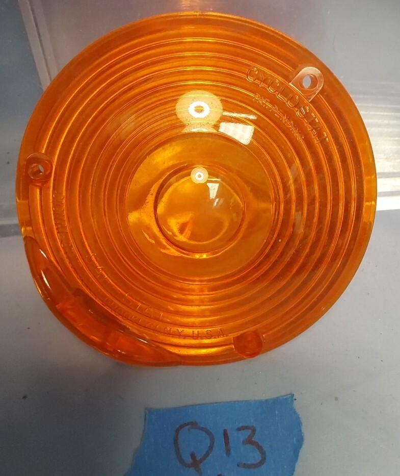 Amber Plastic Replacement Lens  4" Round 3 Screws. Q13