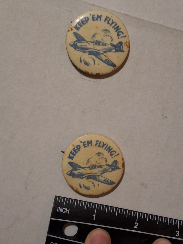WWII KEEP EM FLYING! pinback with fighter plane illustration