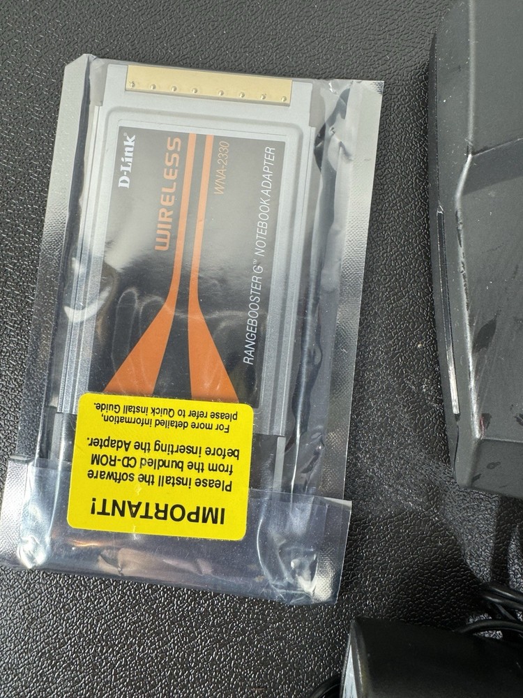 D-Link WNA-2330 Wireless RangeBooster G Notebook Adapter + Power Supply
