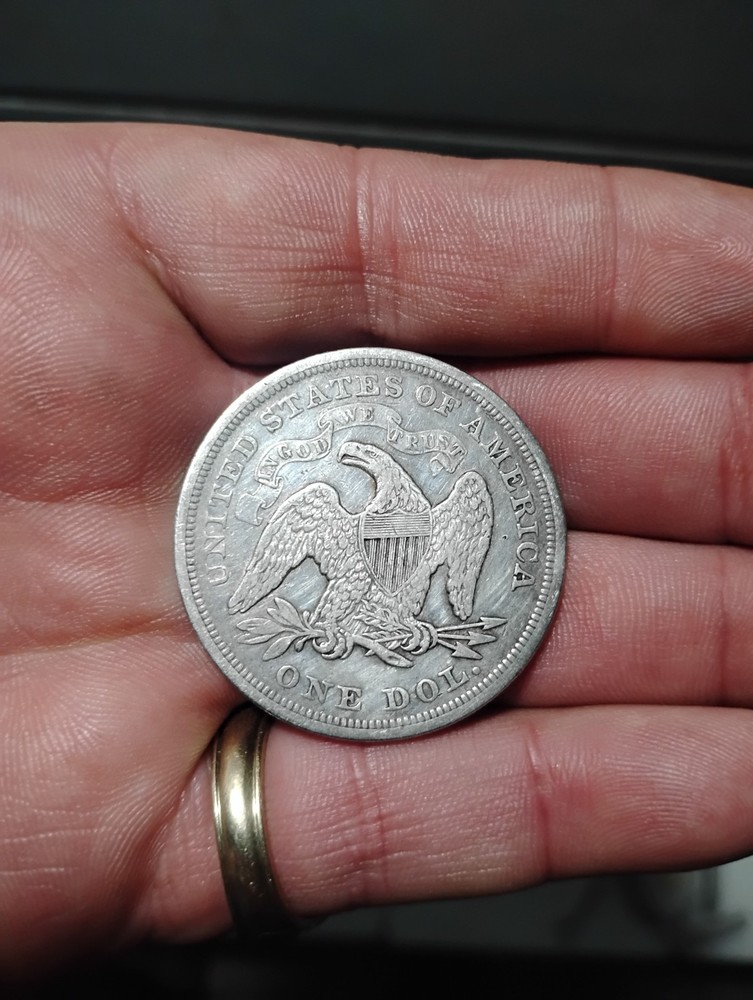 1871 seated dollar XF condition