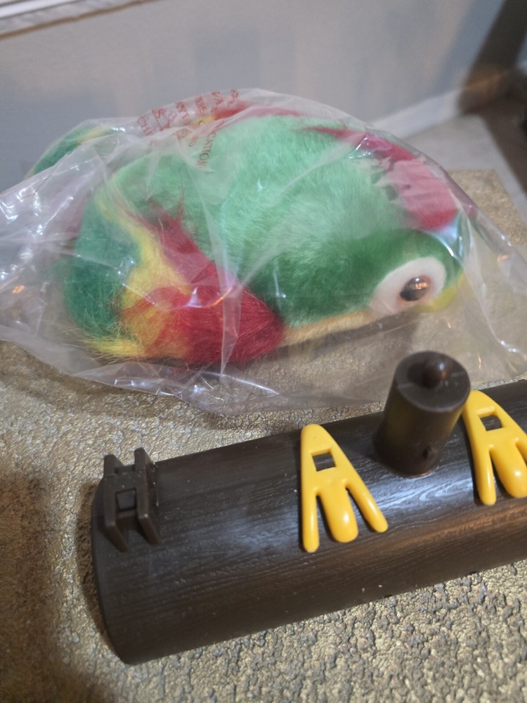 Singing Parrot On Perch