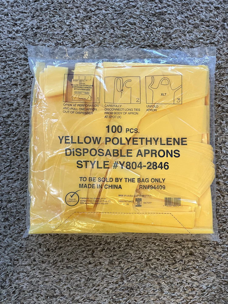 100 pcs Yellow Disposable Polyethylene Aprons – New