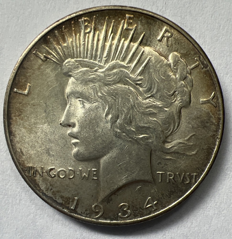 1934-D BU Peace Silver Dollar Obverse Rim Toning