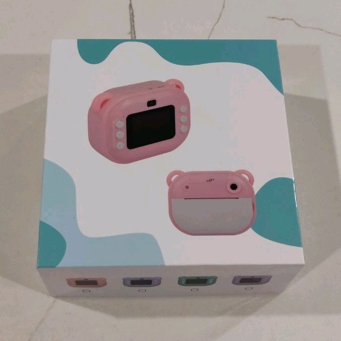 The pink bear-shaped instant print digital  camera