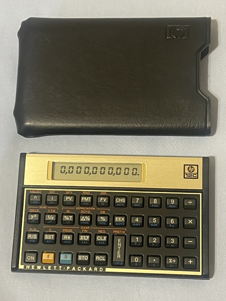 Hewlett-Packard HP-12C Programmable Financial Calculator W/ Case & Handbook