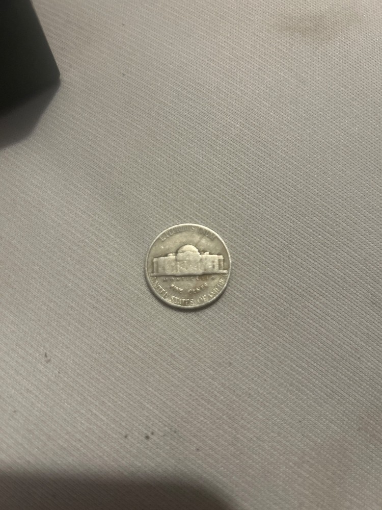 1941 Nickel No mint mark with rim error.