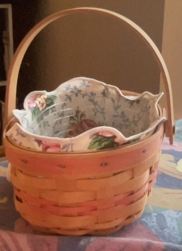 Longaberger Basket. Cloth & Plastic Insert. 1999. 4" Tall x 7" Long.