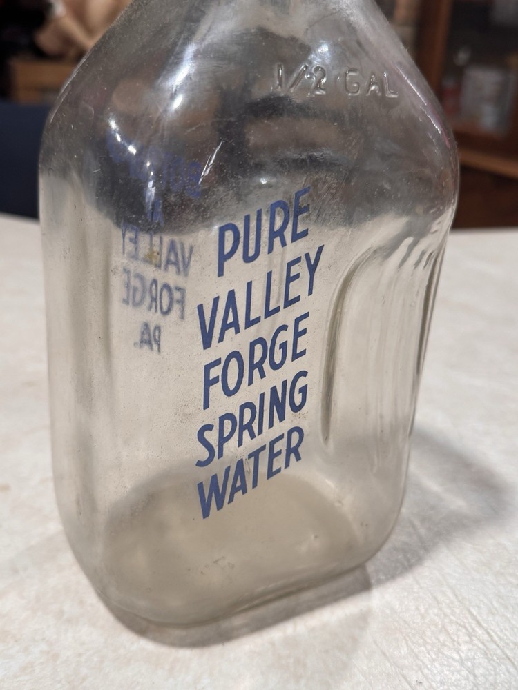 vintage glass spring water bottle