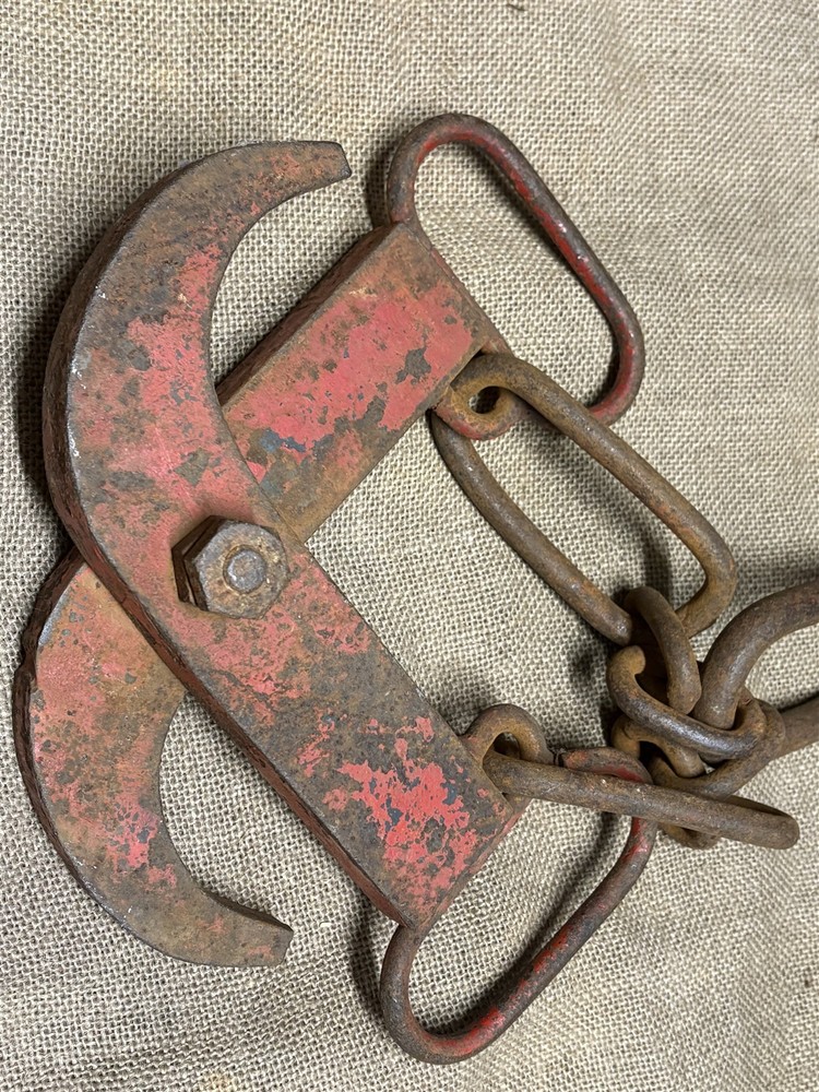 some old grubbing tongs, hoist tool looking things