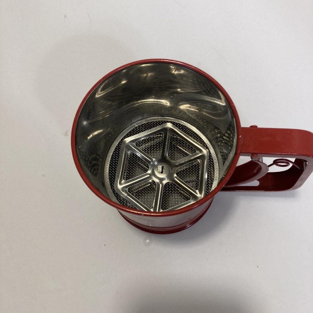 red & white speckled tin enamel hand flour sifter