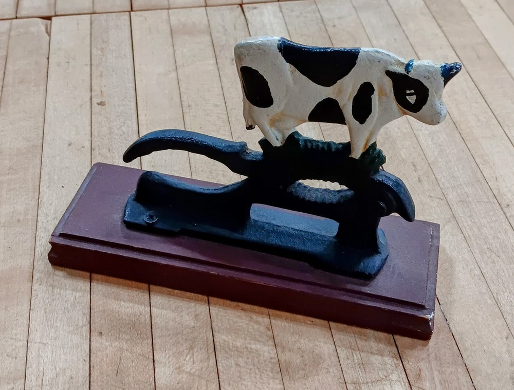 Vintage Cast Iron Cow Nutcracker on Wooden Base