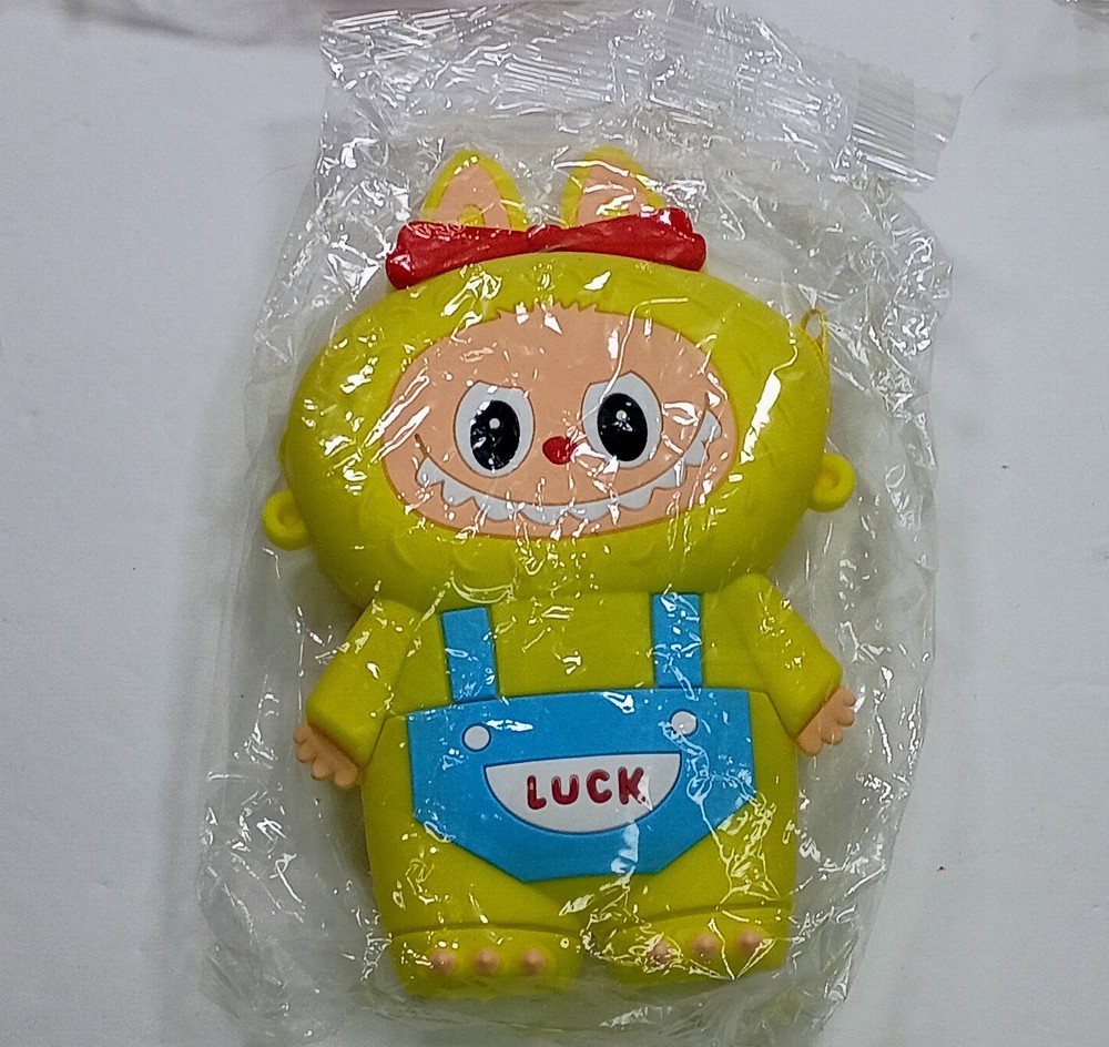 Small Laboboo Character purse with strap. rubber purse